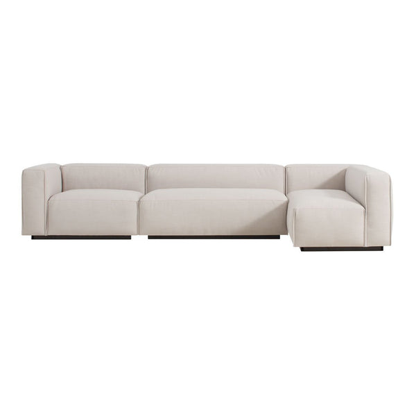 Light beige modern sectional sofa with clean lines and minimalist design, featuring a solid color upholstery.
