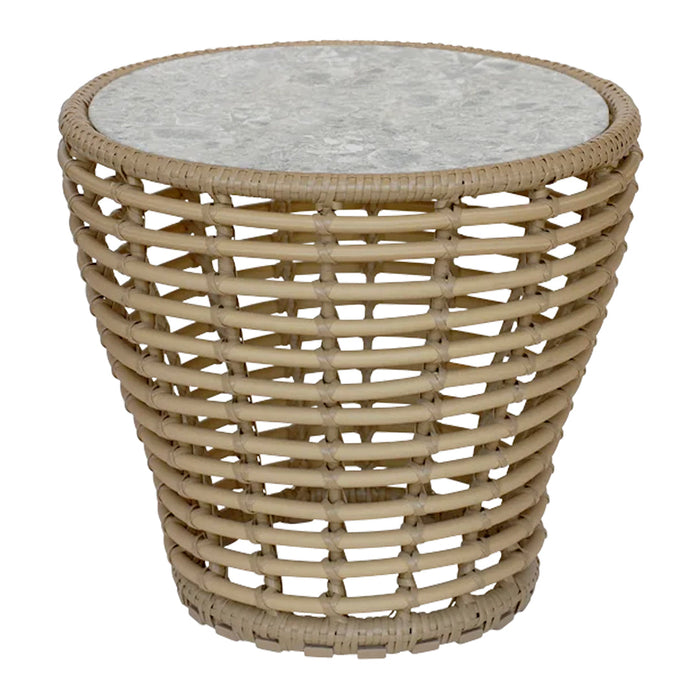 Beige woven rattan side table with a textured white marble top, featuring a modern, round design.