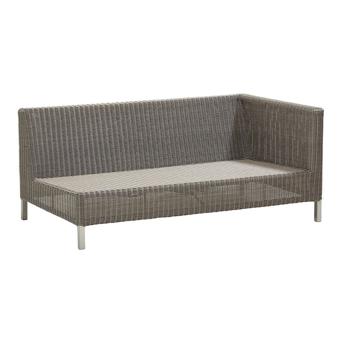 Gray woven outdoor loveseat with a minimalist design and sleek silver legs. Perfect for modern patios.
