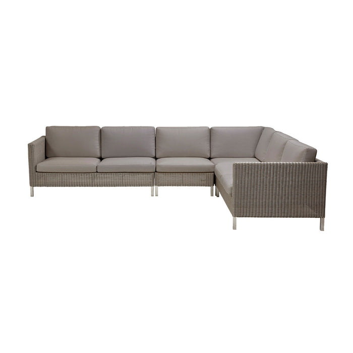 Gray sectional sofa with subtle woven pattern and clean, modern lines. Ideal for contemporary outdoor spaces.