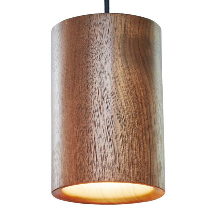 Wooden pendant lamp with a smooth walnut finish and subtle natural patterns, emitting warm, soft light.