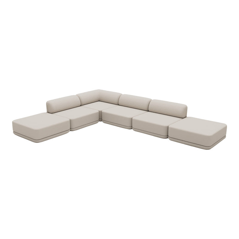 Beige L-shaped sectional sofa with smooth, minimalist design and subtle fabric texture, perfect for modern decor.