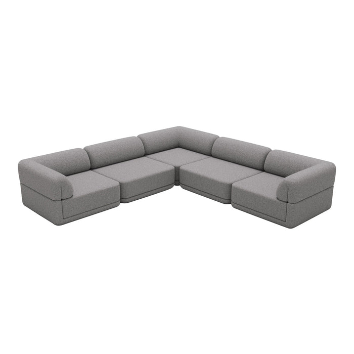 Gray sectional sofa with a modern, minimalist design, featuring solid color upholstery and a clean geometric shape.