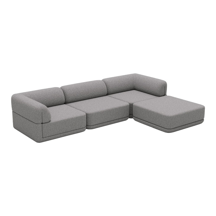 Light gray sectional sofa with clean lines and a minimalist design, perfect for modern living spaces.
