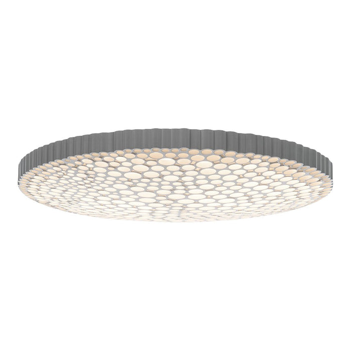 Round ceiling light featuring a sleek gray rim and a honeycomb-patterned white diffuser. Modern and minimalist design.