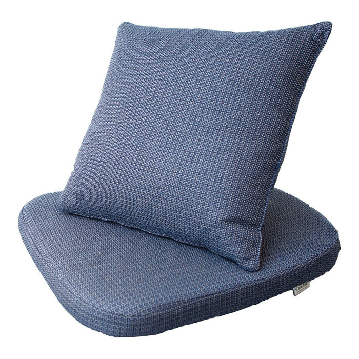 Blue textured cushion set with a woven pattern, featuring a solid blue base and a patterned accent pillow.