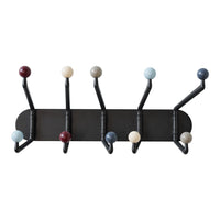 Colorful wall hook rack featuring red, blue, gray, cream, and pale blue knobs on a sleek black base.