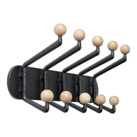 Black wall-mounted coat rack with wooden round hooks, featuring a modern minimalistic design.