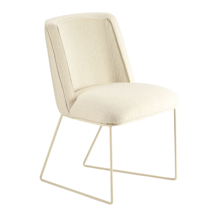 Cream-colored upholstered chair with a minimalist design and soft textured fabric on a sleek metal frame.
