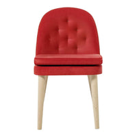 Red tufted chair with smooth upholstery and light wooden legs, perfect for modern decor.