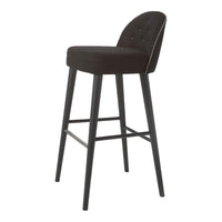 Black upholstered bar stool with button-tufted back and sleek black legs, perfect for modern decor.