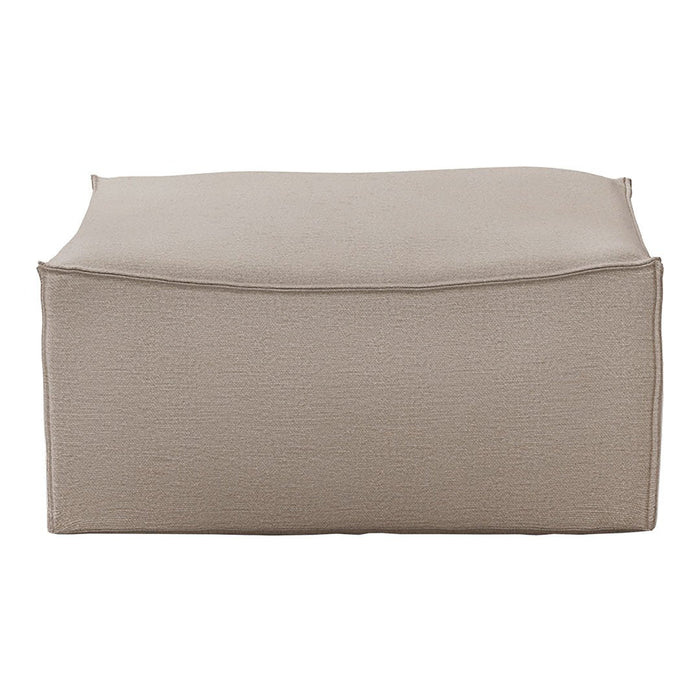 Beige textured pouf with a clean, minimal design, perfect for modern decor.