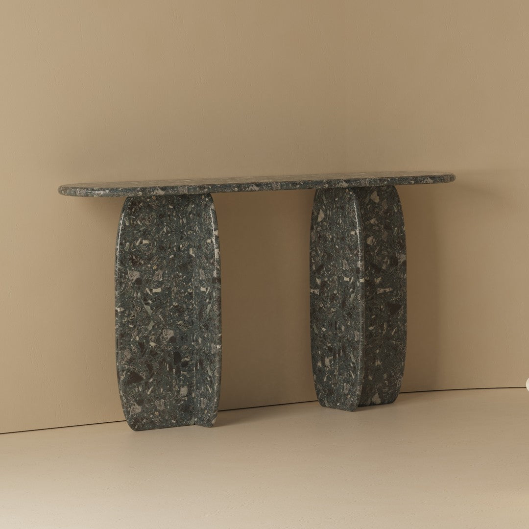 Elegant dark green console table with unique swirling patterns and smooth, polished finish against a neutral backdrop.