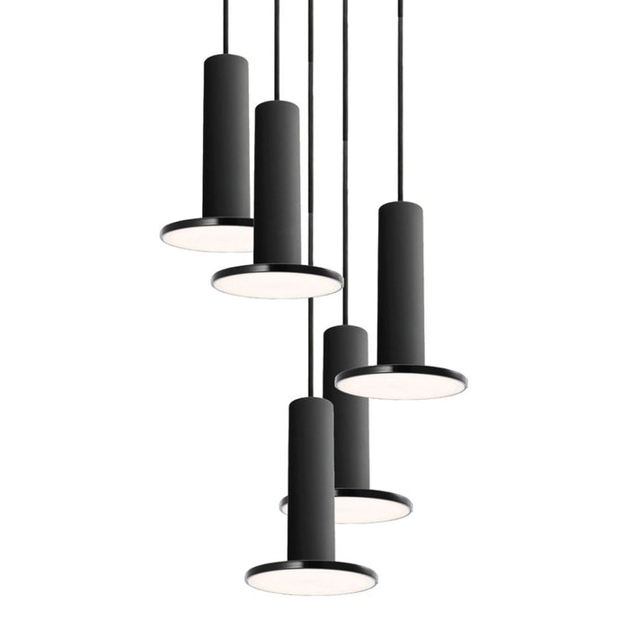 Minimalist black pendant lights with sleek cylindrical shapes and white light bases. Modern design for contemporary spaces.