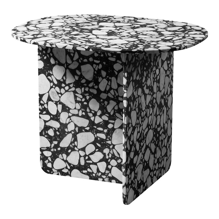 Black and white abstract terrazzo table with a round top and geometric pattern, perfect for modern decor.