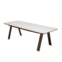White rectangular table with a sleek design and dark wood legs. Perfect for modern dining or workspace.