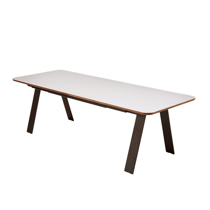 White rectangular table with a sleek design and dark wood legs. Perfect for modern dining or workspace.