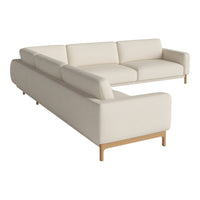 L-shaped sofa in soft beige fabric with clean lines and light wooden legs for a modern, minimalist look.