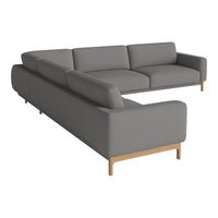 Gray sectional sofa with clean lines and wood legs, featuring a modern, minimalist design. Perfect for stylish interiors.
