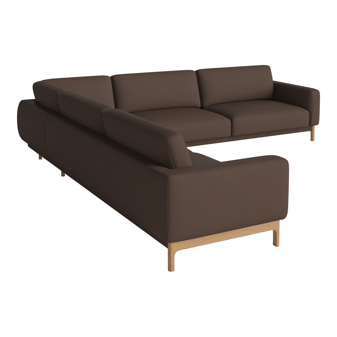 Brown sectional sofa with a modern design and smooth fabric, featuring minimalist wooden legs. Perfect for any living space.