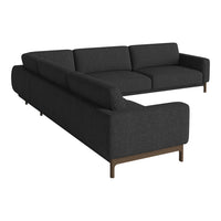 Modern dark gray sectional sofa with a textured fabric pattern and sleek wooden legs. Ideal for contemporary living spaces.