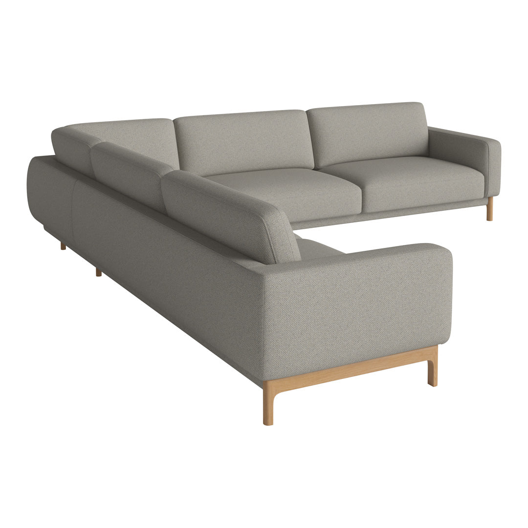 Light gray sectional sofa with a clean, minimalist design and wood leg accents, perfect for modern decor.