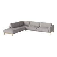Modern gray sectional sofa with clean lines and a minimalist design, featuring a light wood frame and plush cushions.