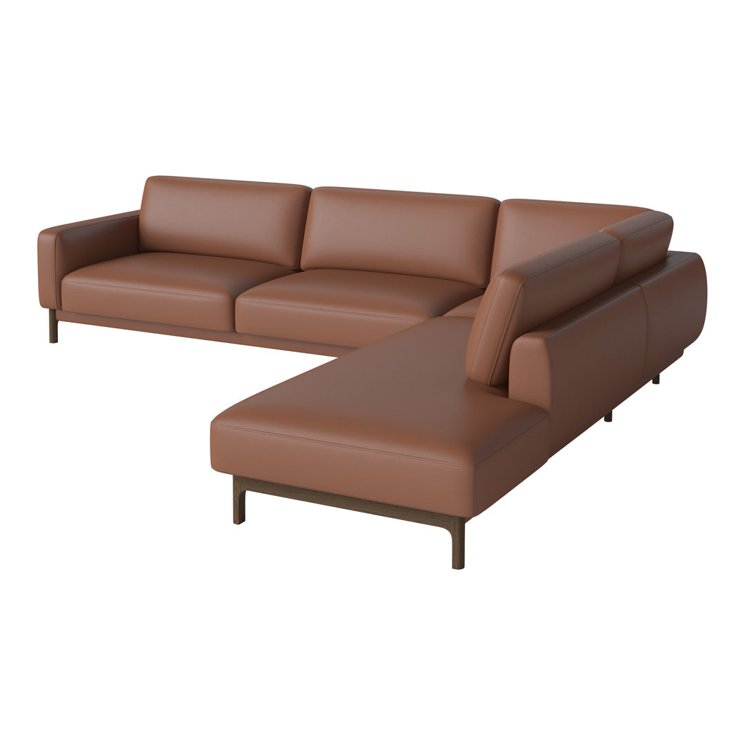 Brown leather sectional sofa with a smooth texture and minimalist design. Perfect for modern living spaces.