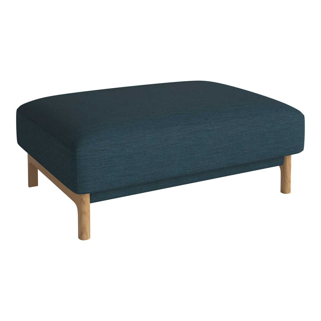 Teal upholstered ottoman with natural wood legs, featuring a simple, modern design and smooth texture.