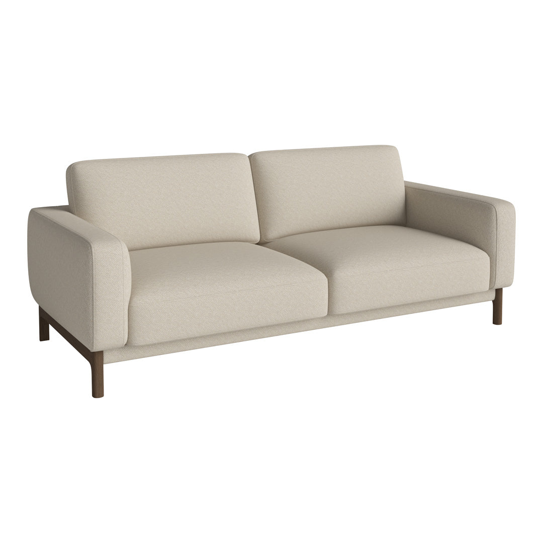 Cream-colored sofa with smooth upholstery and minimalist design, featuring wooden legs for a modern look.