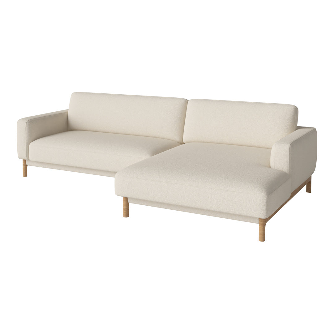 Modern cream sectional sofa with smooth fabric and natural wood legs, featuring a minimalist design for contemporary decor.