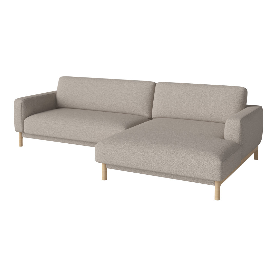 "Light beige modern sectional sofa with simple lines and natural wood legs."