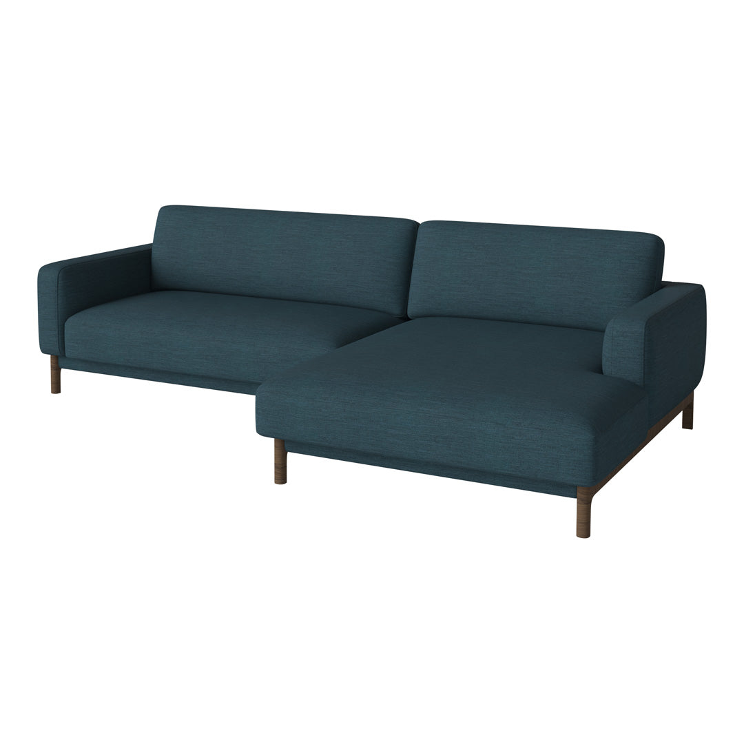Dark teal fabric sofa with a sleek, modern design and simple wooden legs, perfect for contemporary decor.