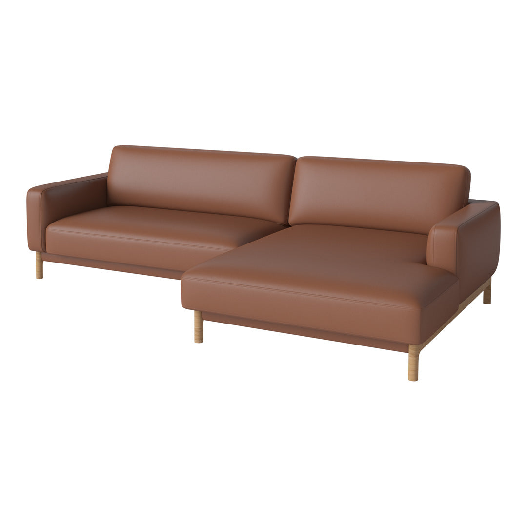 Brown leather sectional sofa with smooth texture and light wood legs, perfect for modern living spaces.