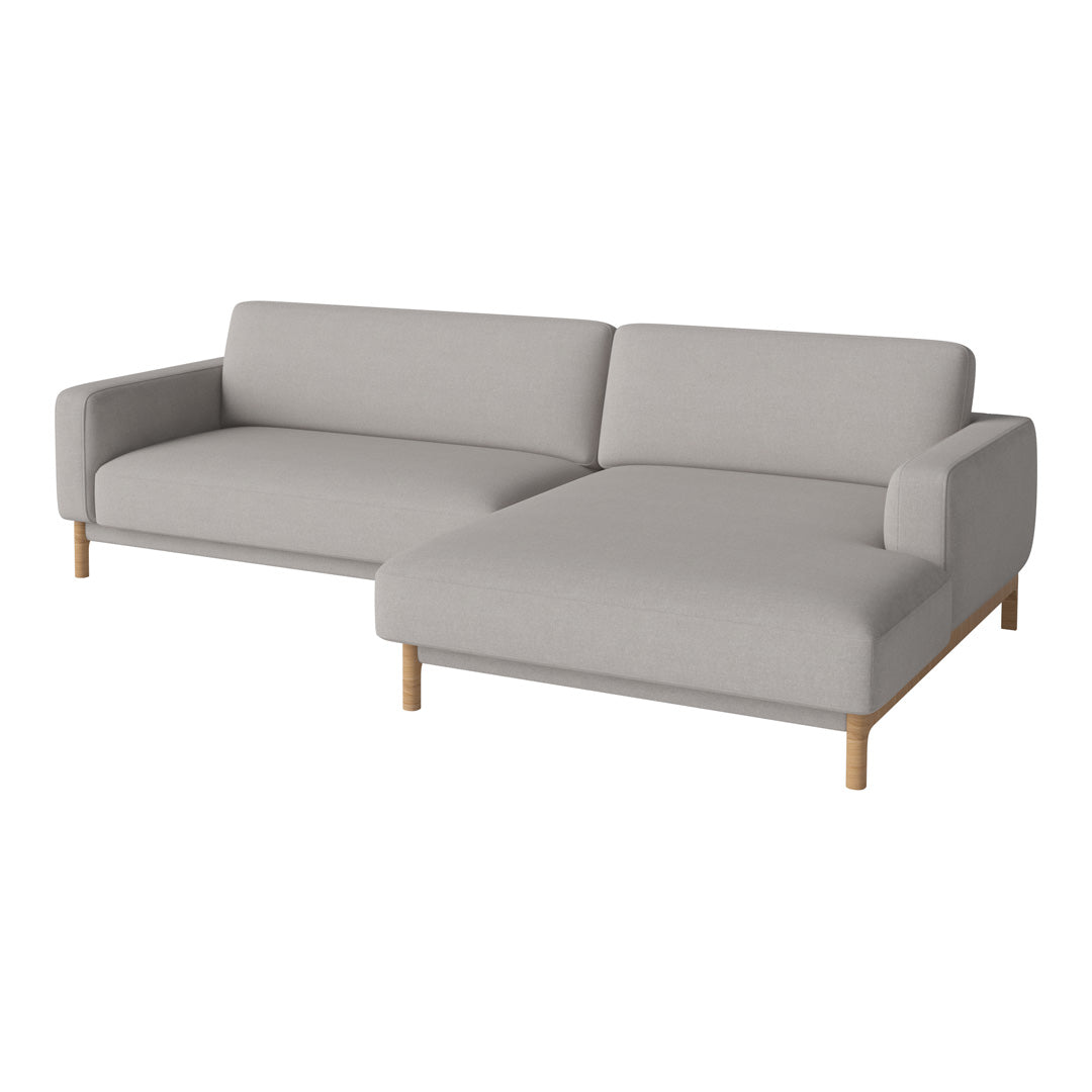 Light grey fabric sectional sofa with clean lines and wooden legs, offering a modern, minimalist design.