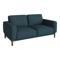 Teal fabric sofa with a smooth texture and minimal pattern, featuring clean lines and wooden legs for a modern look.