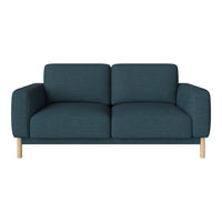 Teal upholstered sofa with a sleek, modern design and light wooden legs, featuring a textured fabric pattern.