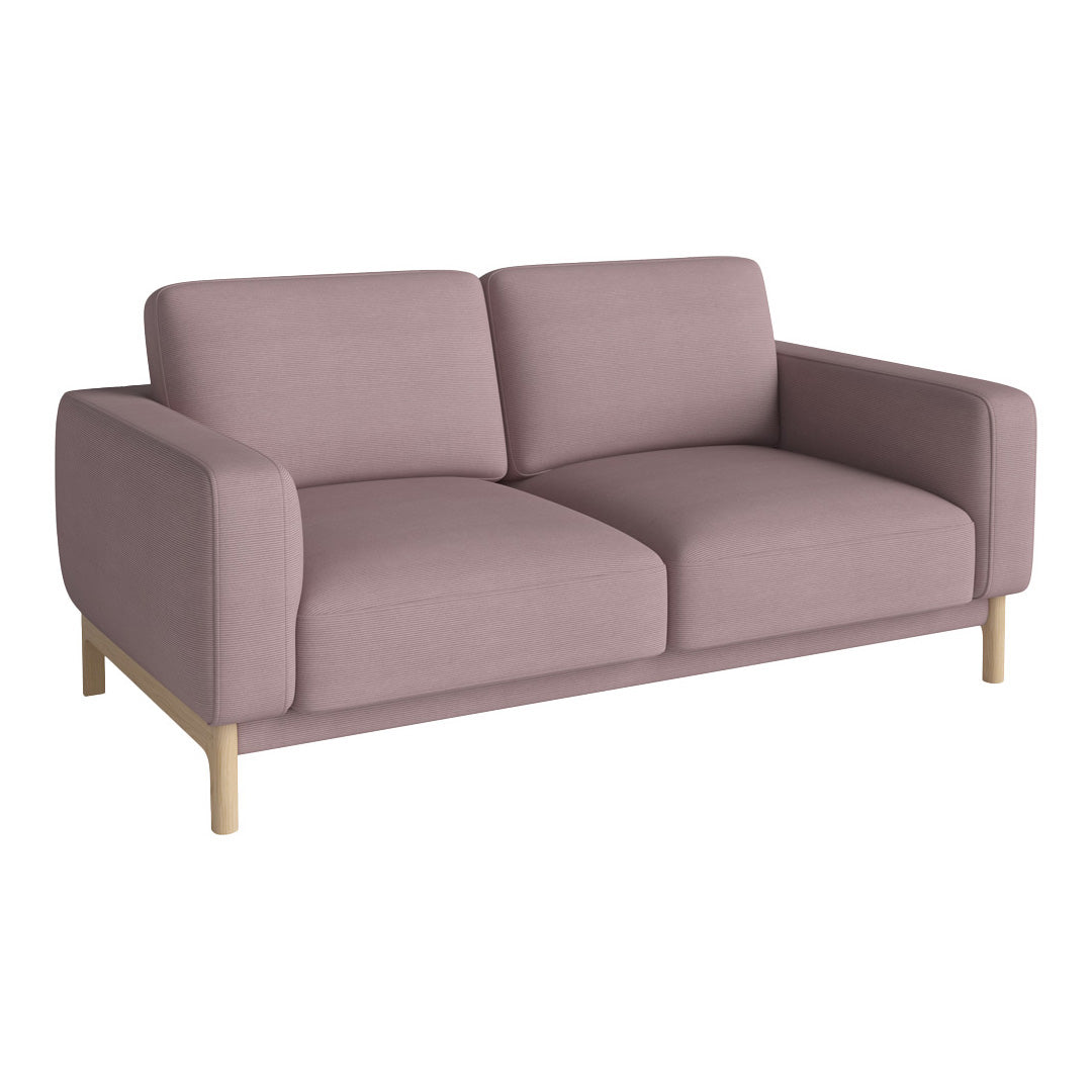Light mauve sofa with a minimalist design and soft fabric, featuring a wooden base for a modern look.
