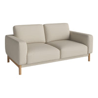 Neutral beige sofa with a smooth texture and minimalist design, featuring light wooden legs and no visible patterns.