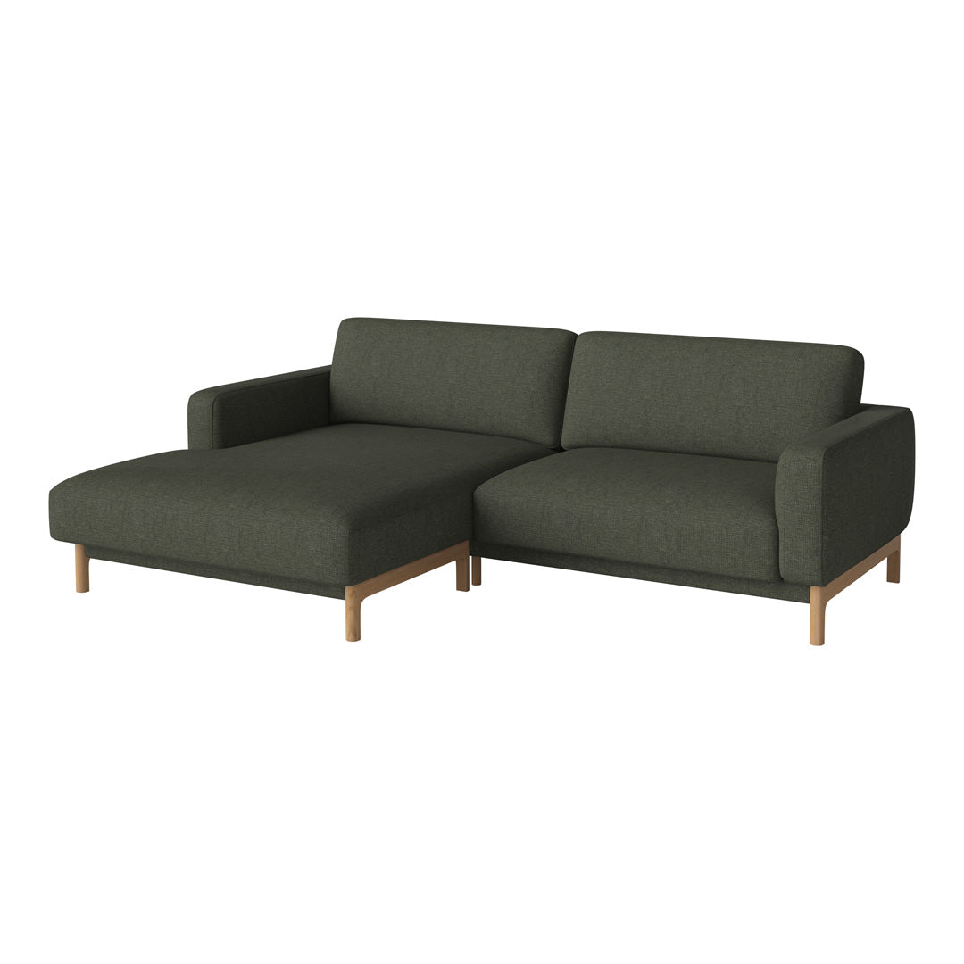 Modern dark green sectional sofa with clean lines and light wood legs, perfect for contemporary living spaces.