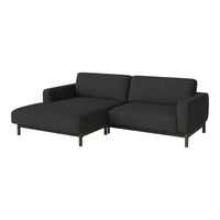 Elegant dark gray sectional sofa with a minimalist design and subtle textured fabric, complemented by wooden legs.