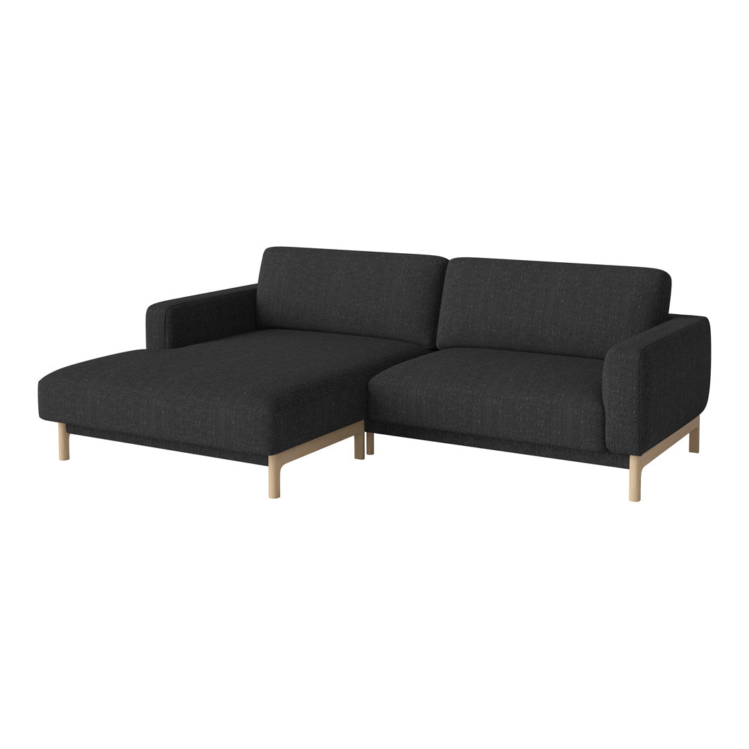 Stylish black sectional sofa with a modern minimalist design and light wooden legs, perfect for contemporary spaces.