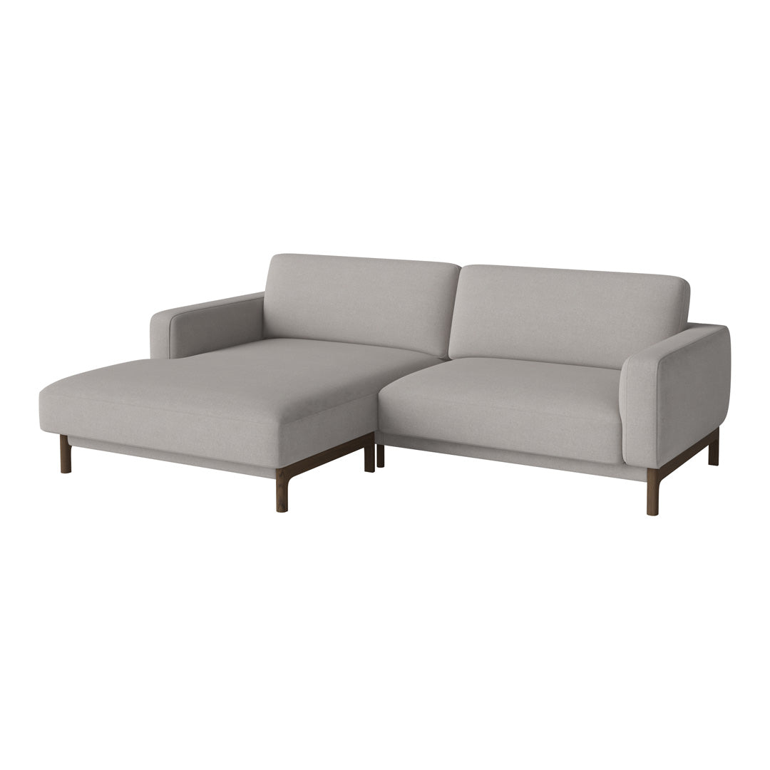 Light gray sectional sofa with a minimalist design and sleek brown wooden legs. Perfect for modern living spaces.