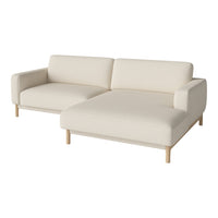 Beige two-piece sofa with a minimalist design and solid wood legs, featuring a smooth, textured fabric.