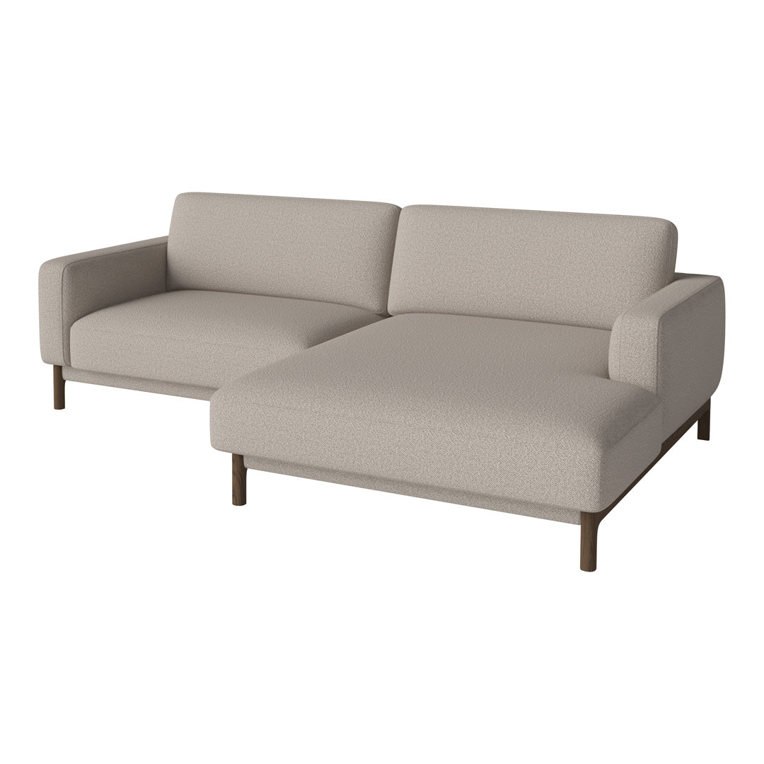 Light beige sectional sofa with a minimalist design and smooth fabric, featuring a solid brown wood frame.
