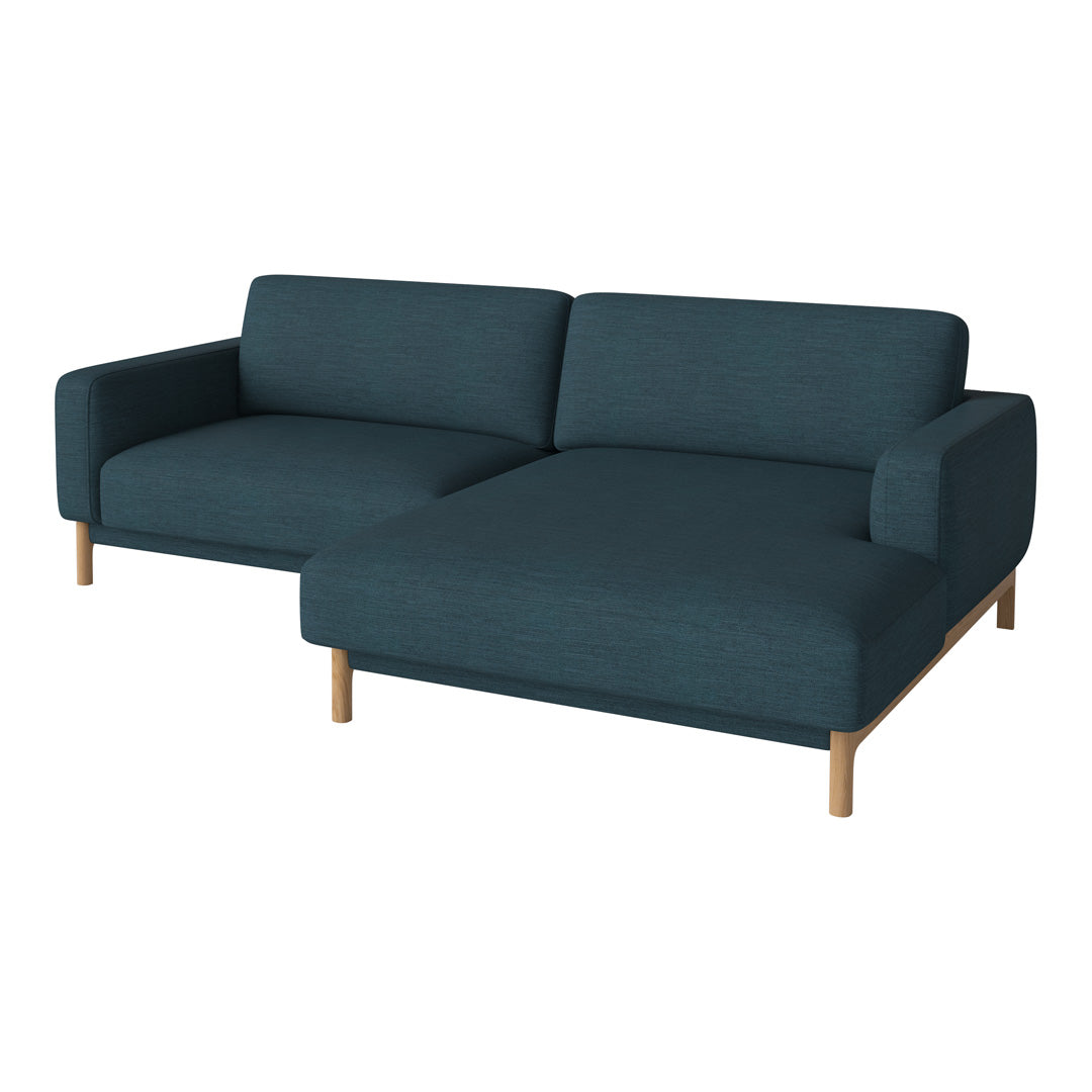 Teal fabric sofa with modern design and light wooden legs, showcasing a solid pattern for a stylish living space.
