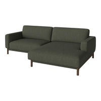 Dark green, fabric sectional sofa with clean lines and a minimalist design, featuring a solid wood base.