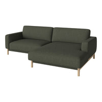 Green fabric sectional sofa with smooth texture and natural wooden legs. Perfect for modern living spaces.