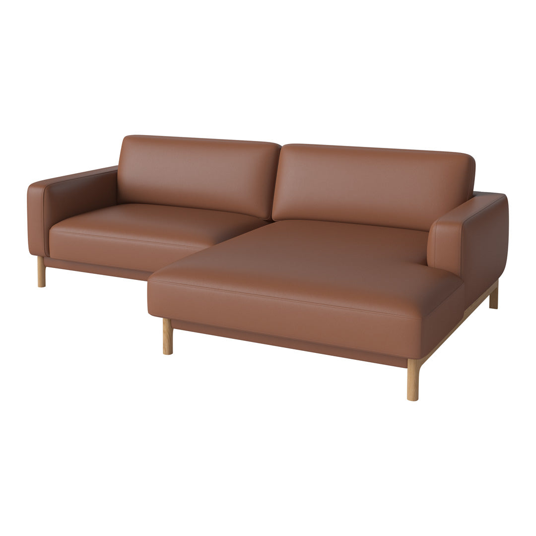 Brown leather sectional sofa with a smooth texture and minimalist design. Ideal for modern living spaces.