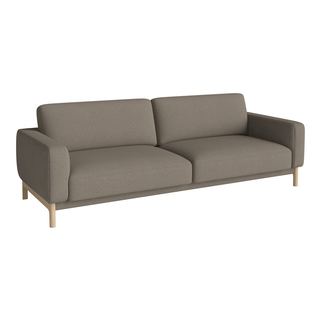 Contemporary beige sofa with clean lines and light wooden legs, perfect for modern living spaces.